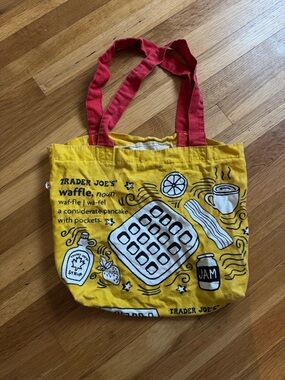 Trader Joe's Yellow Waffle Tote Bag with Red Handles